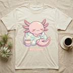 Axolotl Not Today T-Shirt in Natural — Kawaii chibi illustration of an axolotl curled in a blanket with a mug and a soft caption reading Not Today.