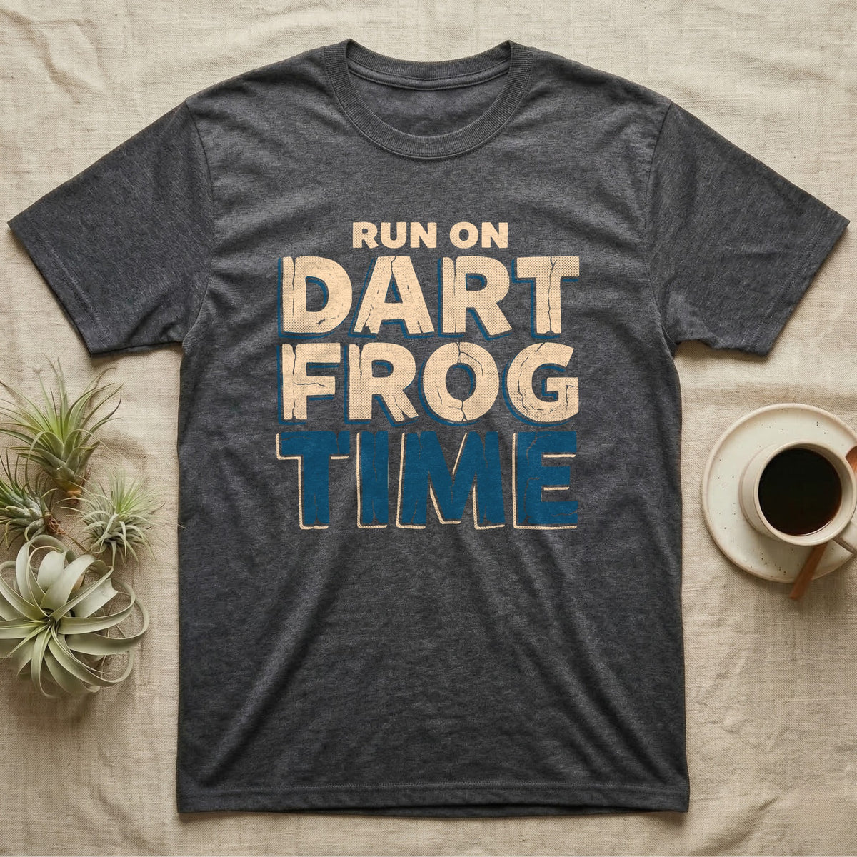 Dart Frog Time T-Shirt in Dark Heather — Distressed-block wordmark reading run on dart frog time in a bold two-tier chest lockup, text only.