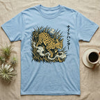 Light blue t-shirt with a stylized serval cat in tall grass and Japanese text.