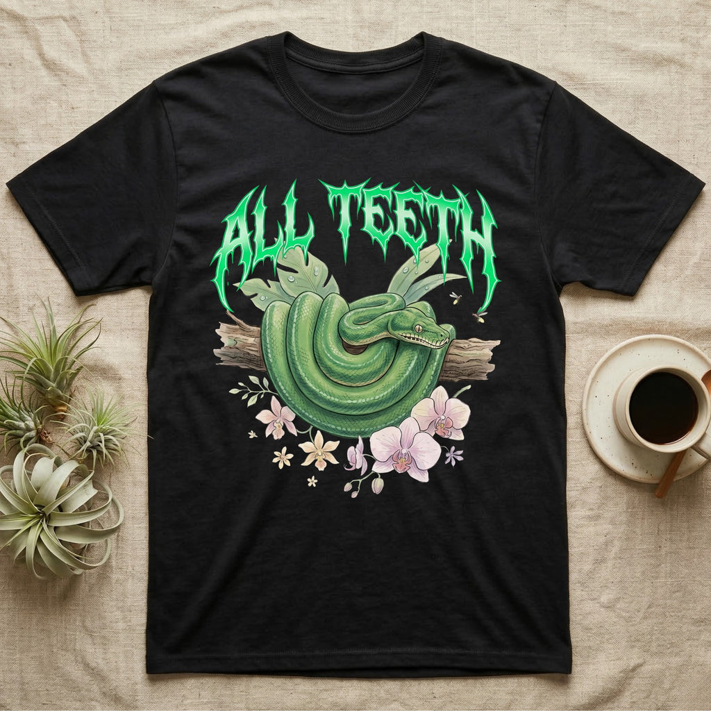 Emerald Tree Boa Feral T-Shirt in Black — Coiled emerald tree boa on a branch below a dripping emerald-green metal "All Teeth" wordmark