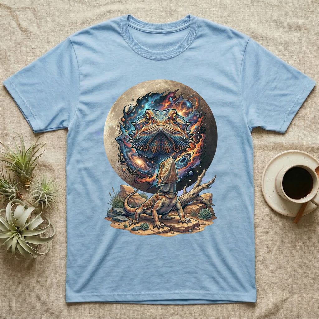 Light blue t-shirt with a cosmic bearded dragon design under a full moon.