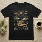 Western Hognose Home Range T-Shirt in Black — Woodcut-style illustration of a western hognose snake nosing through sand with dunes and sagebrush behind, no on-shirt text.