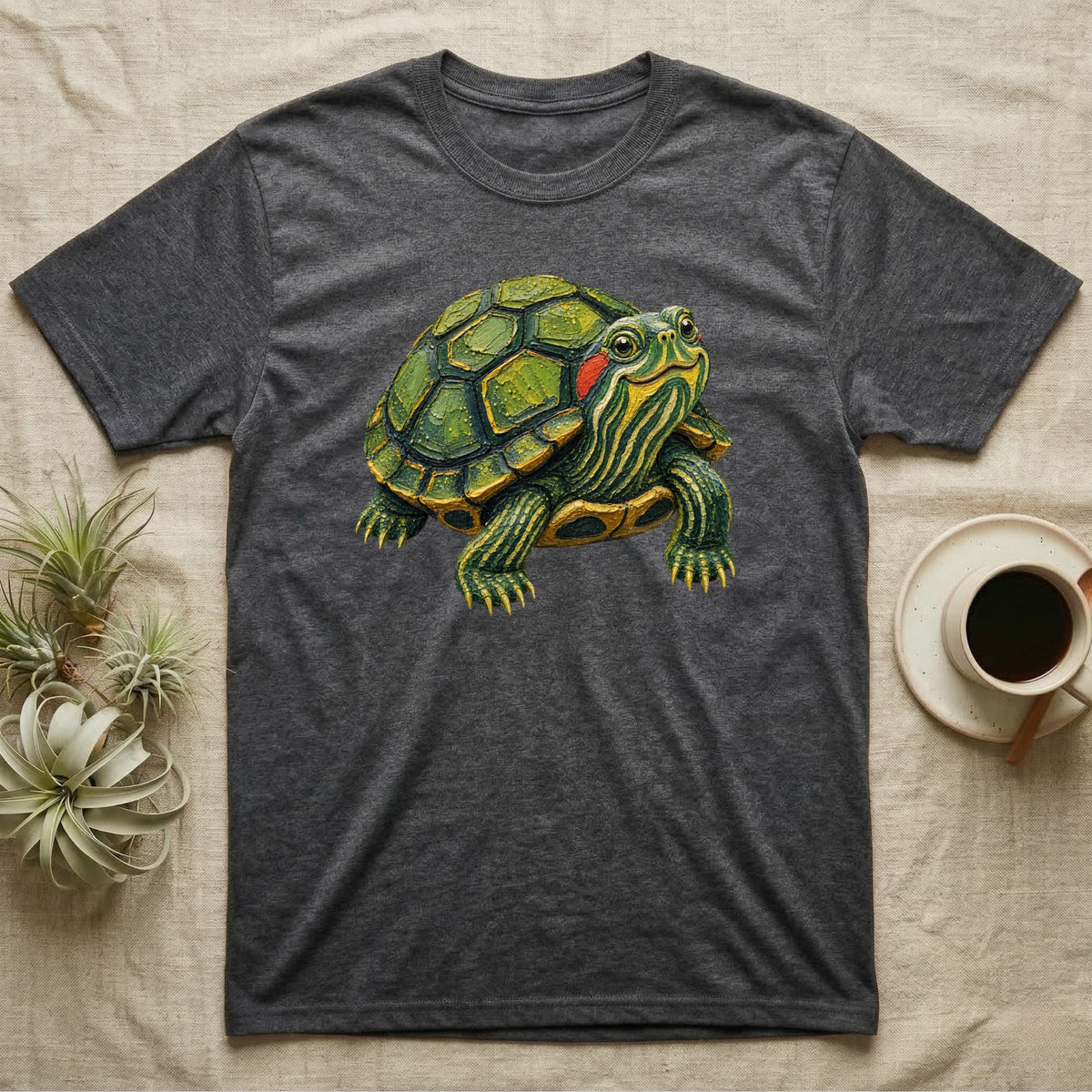 Dark gray t-shirt featuring a watercolor illustration of a red-eared slider turtle.