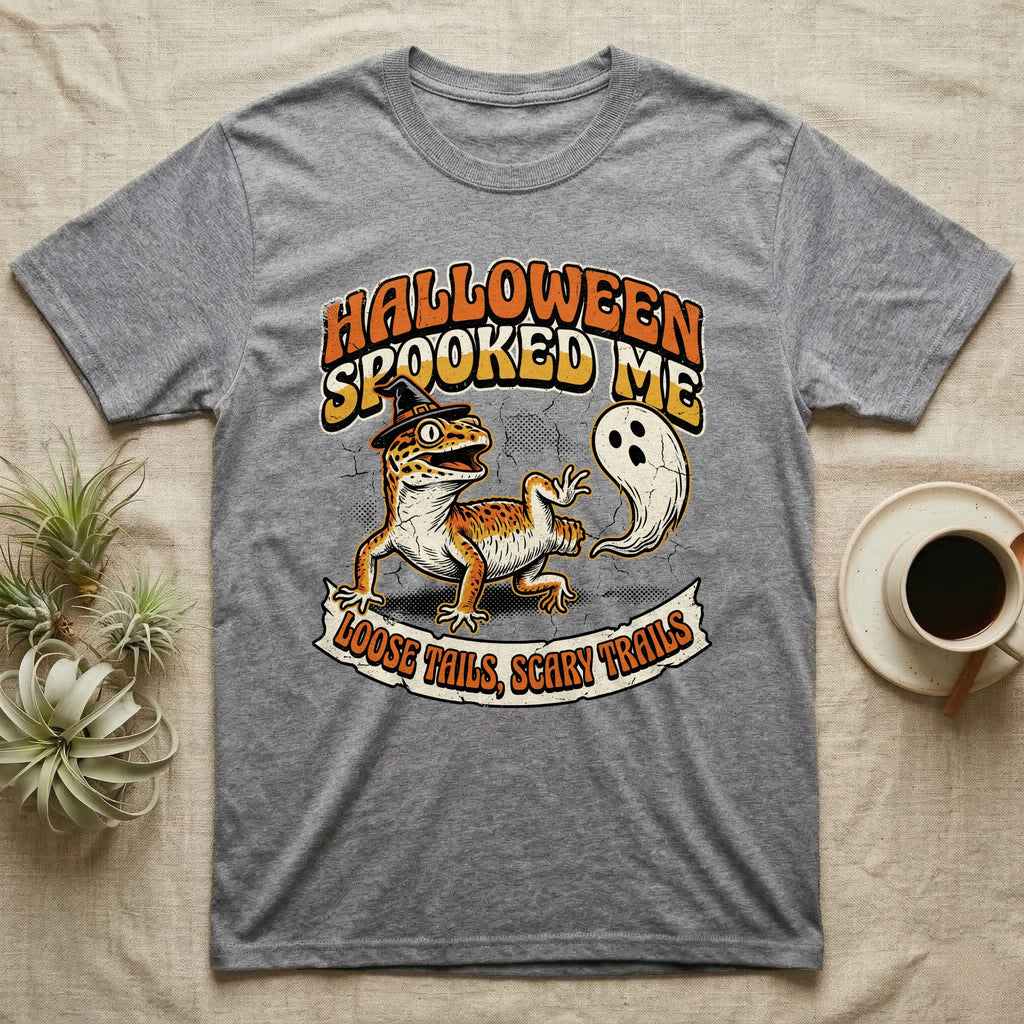 Leopard Gecko Spooked Me T-Shirt in Sport Grey — Distressed graphic of a shocked leopard gecko in a witch hat beside its ghost-costumed dropped tail, "Halloween Spooked Me."