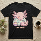 Axolotl Not Today T-Shirt in Black — Kawaii chibi illustration of an axolotl curled in a blanket with a mug and a soft caption reading Not Today.