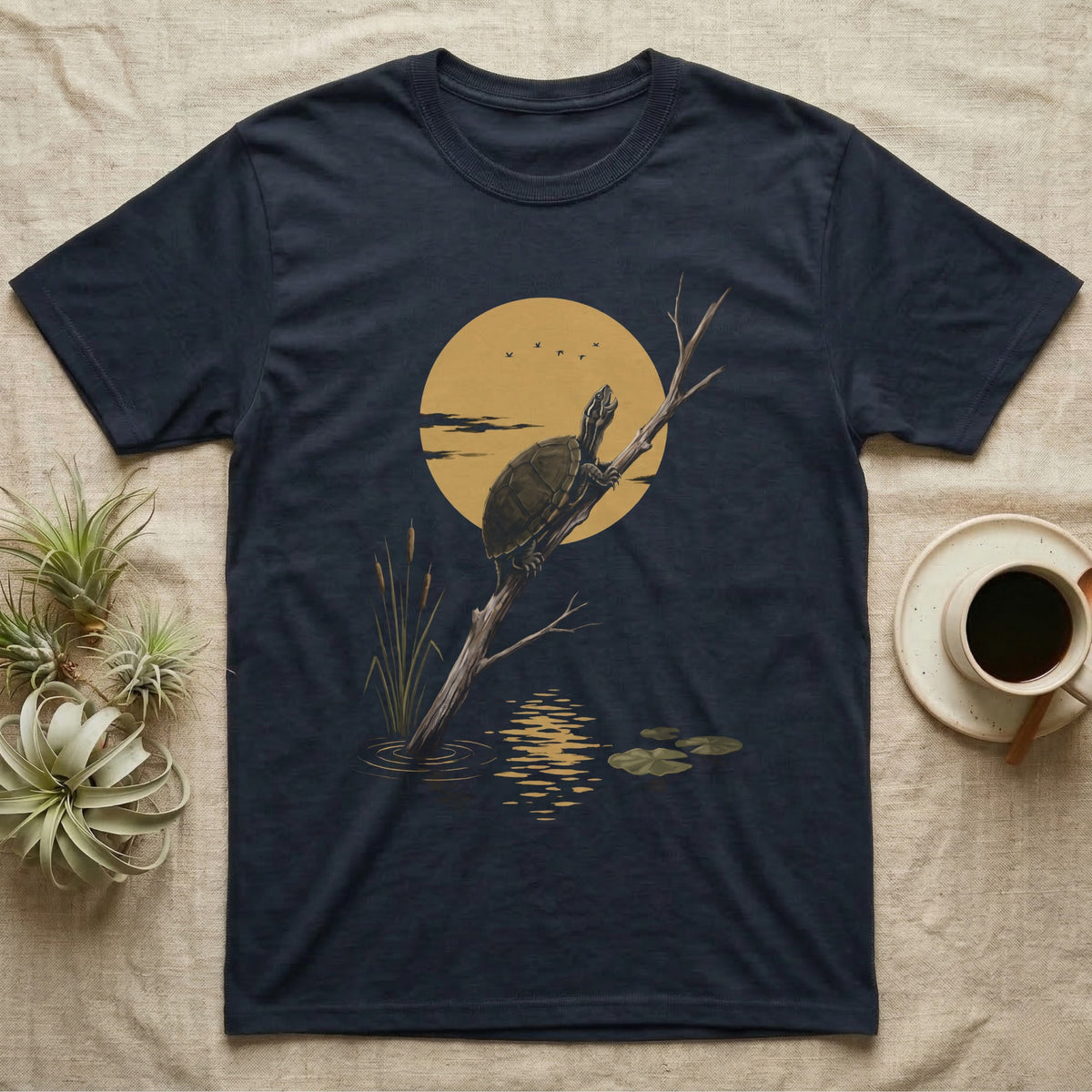 Musk Turtle Moon T-Shirt in Navy — Painted 90s wildlife art of a musk turtle on a bare branch howling at a big golden moon behind it, cattails and lily pads below, on black