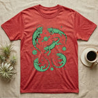 Green Iguana Cosmic T-Shirt in Heather Red — Vintage screen-print illustration of green iguanas in astronaut helmets floating in space, cosmic emerald green monochromatic on dark background.