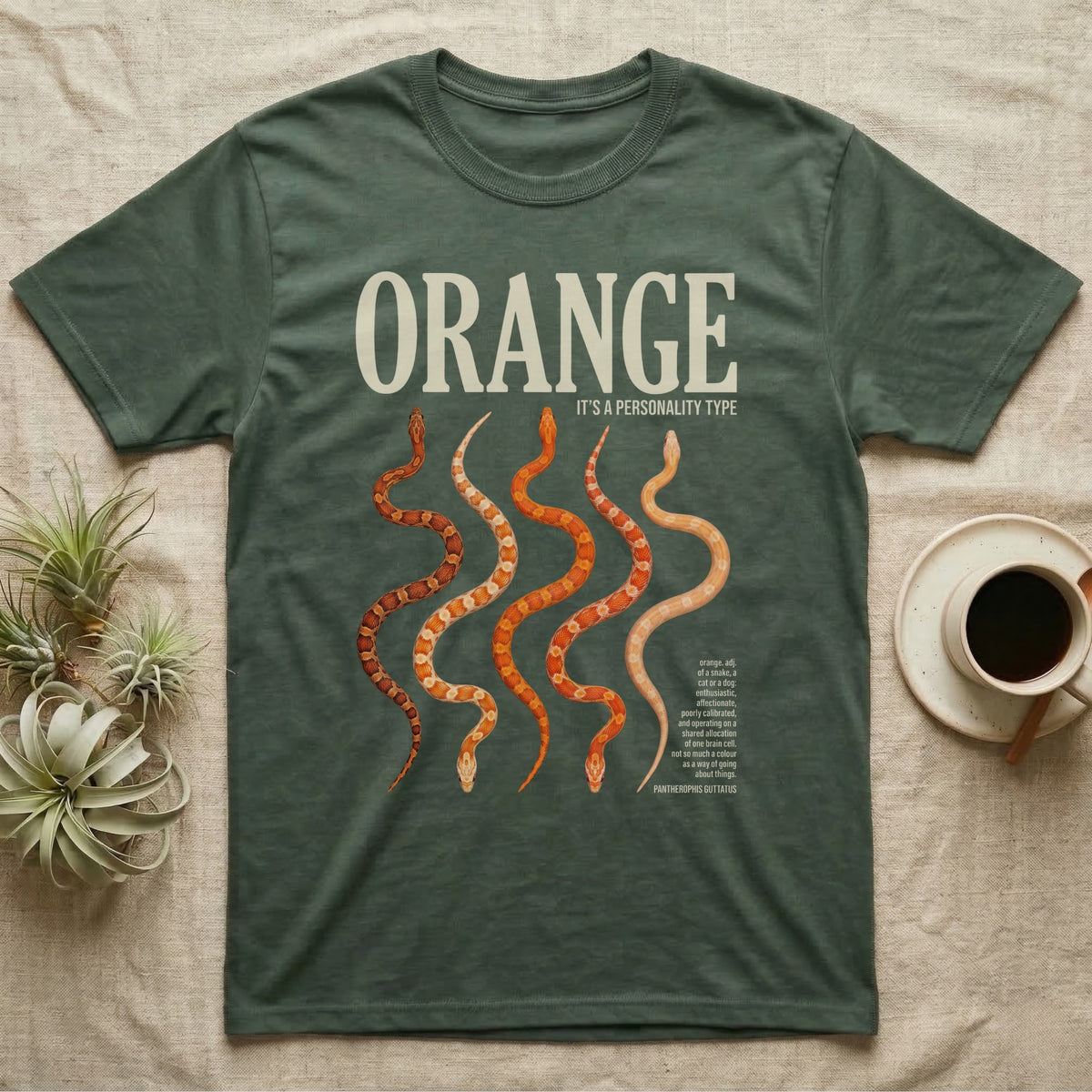 Corn Snake Morphs Orange Personality T-Shirt in Military Green — Photo collage of seven orange corn snake morphs beneath a large serif headline and a dictionary block.