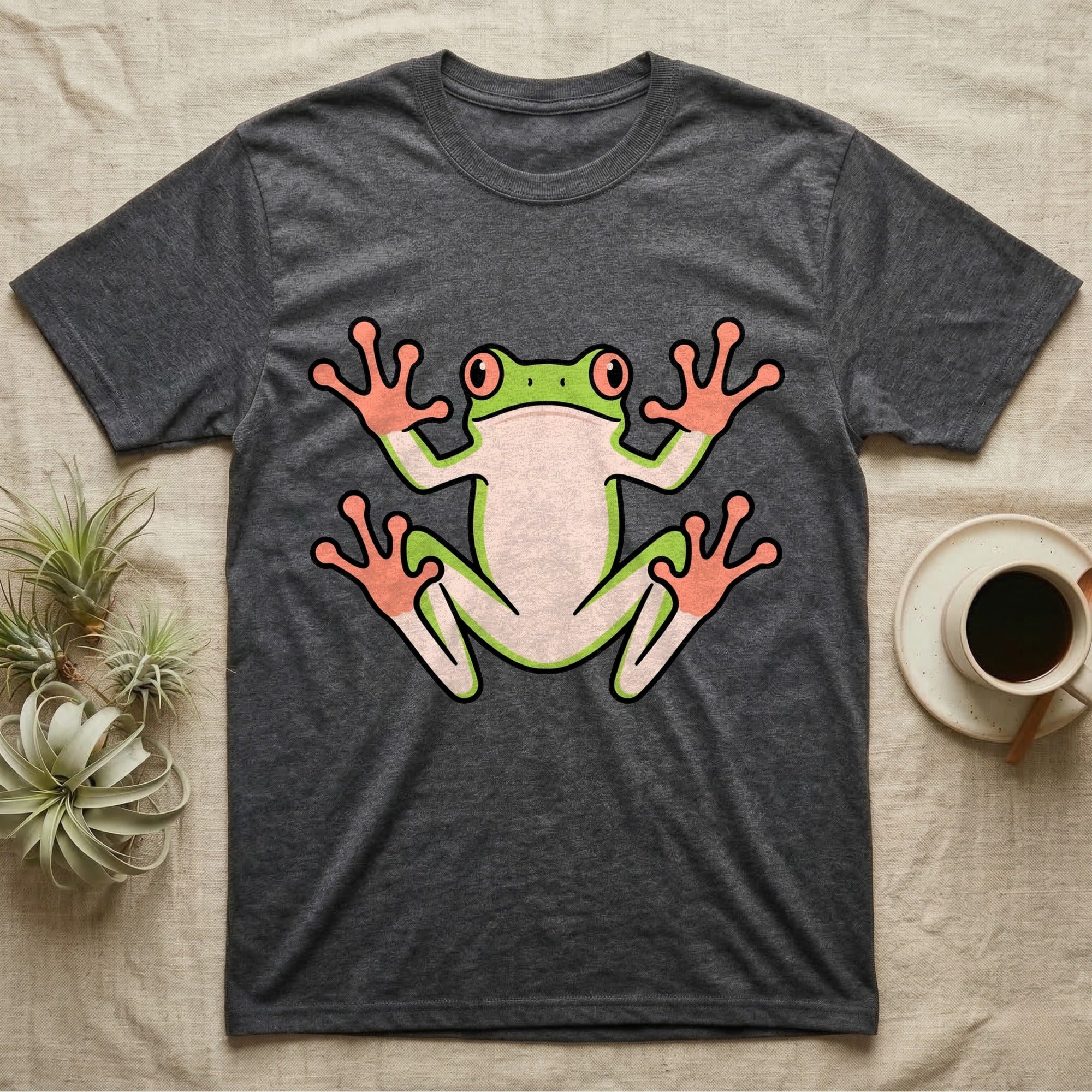 Tree Frog On Glass T-Shirt in Dark Heather — Vector-bold tree frog plastered against implied glass, suction feet splayed wide, small "Tree Frog On Glass." caption.
