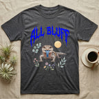 Northern Blue-Tongue Skink Feral T-Shirt in Dark Heather — Blue-tongue skink with its blue tongue out under a jagged cobalt-blue metal "ALL BLUFF" wordmark and pastel leaves.