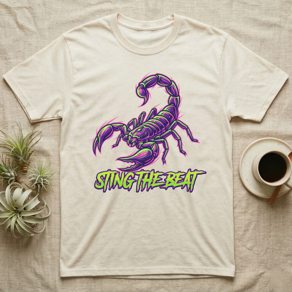 Scorpion graphic with "Sting The Beat" text on a light t-shirt.