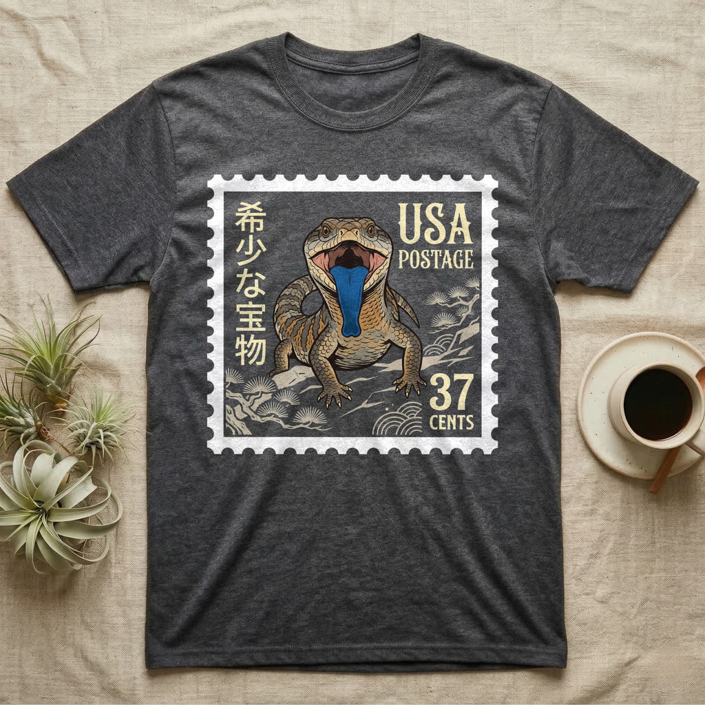 Dark t-shirt featuring a stamp with a blue-tongued lizard, USA postage, and Chinese characters.