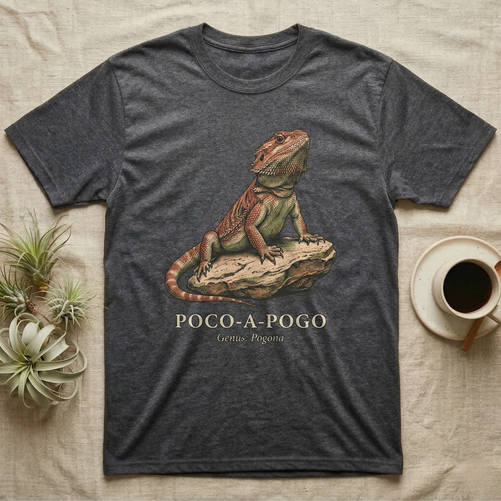 Dark grey t-shirt with a bearded dragon on a rock and text.