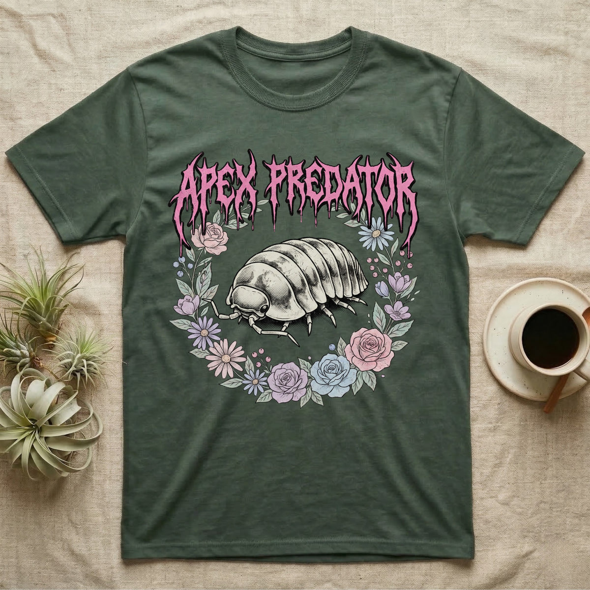 Apex Predator Isopod T-Shirt in Military Green — Bootleg design of a cute isopod in a floral wreath under dripping death-metal lettering reading "Apex Predator."