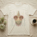 Chameleon wearing oversized glasses and pearl necklace on a light cream t-shirt.