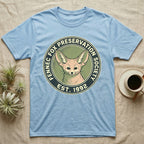 Light blue t-shirt with Fennec Fox Preservation Society logo.