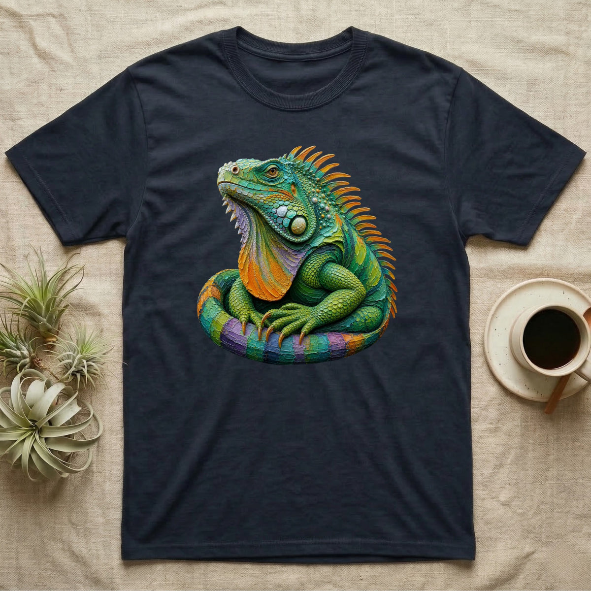 Dark t-shirt with a colorful, detailed iguana graphic on the chest.