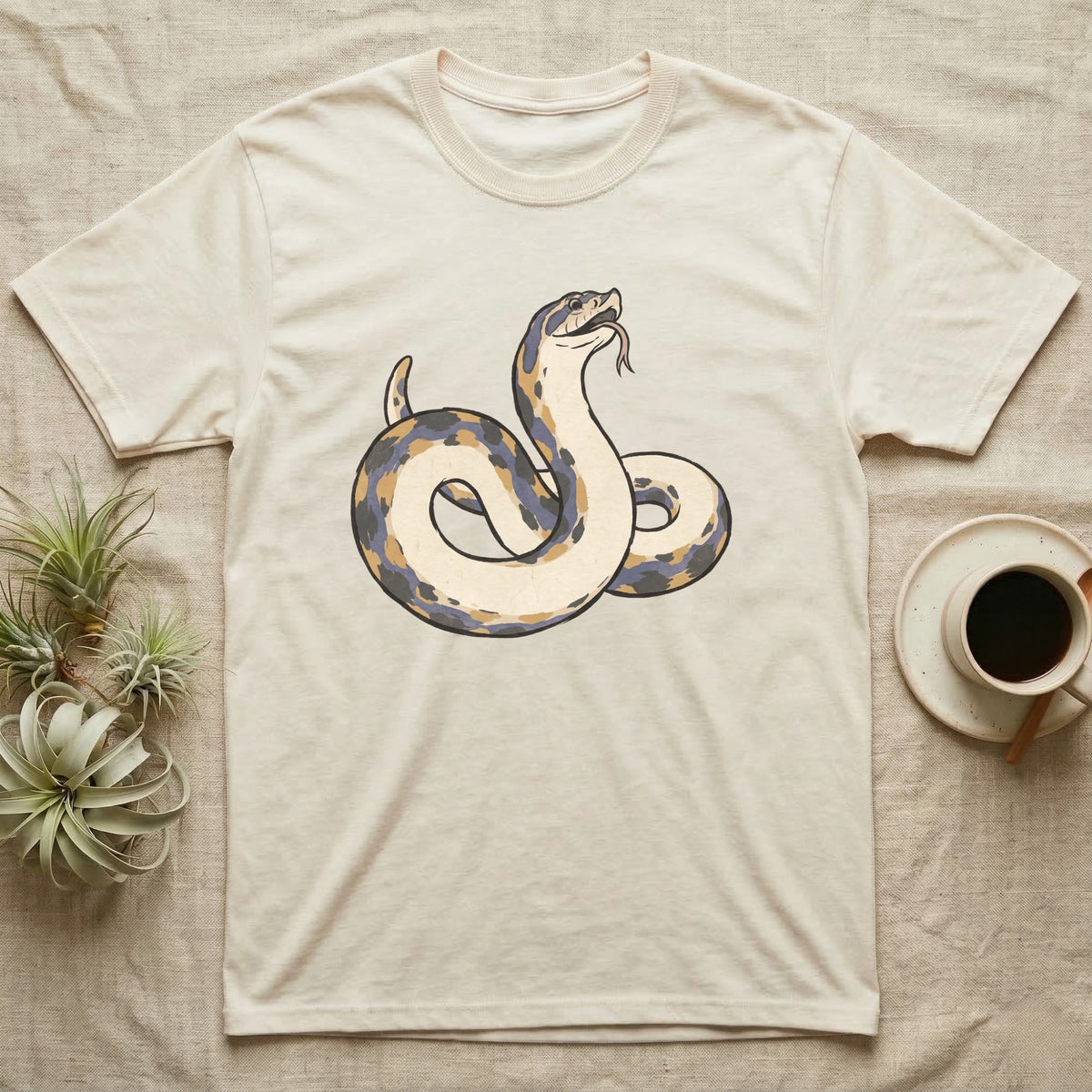 Hognose Play Dead T-Shirt in Natural — Ukiyo-e woodblock illustration of a western hognose snake playing dead belly-up with a deadpan serif caption beneath.