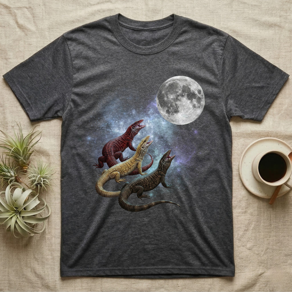 Ackie Monitor Moon Howl T-Shirt in Dark Heather — Three Ackie Monitor colour morphs howling at a full moon over a nebula on a dark grey t-shirt.