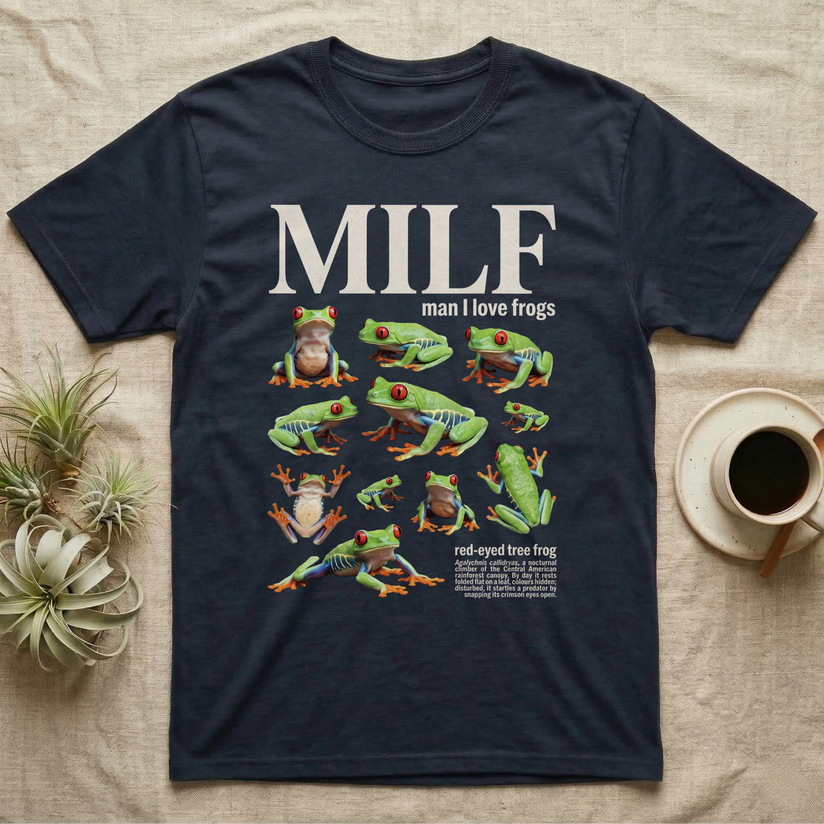 Red-Eyed Tree Frog MILF T-Shirt in Navy — Eight red-eyed tree frogs in a cut-out photo collage beneath the huge cream word MILF on grey.