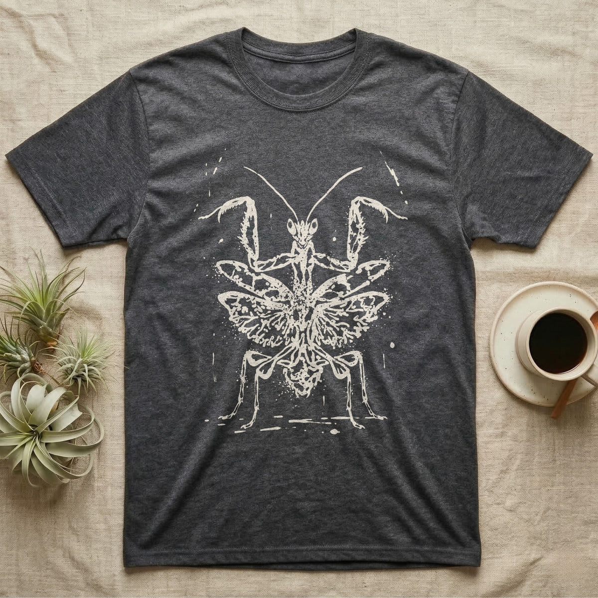 Orchid Mantis Threat Display T-Shirt in Dark Heather — Bleach-spatter stencil illustration of an orchid mantis reared square-on into a full threat display.