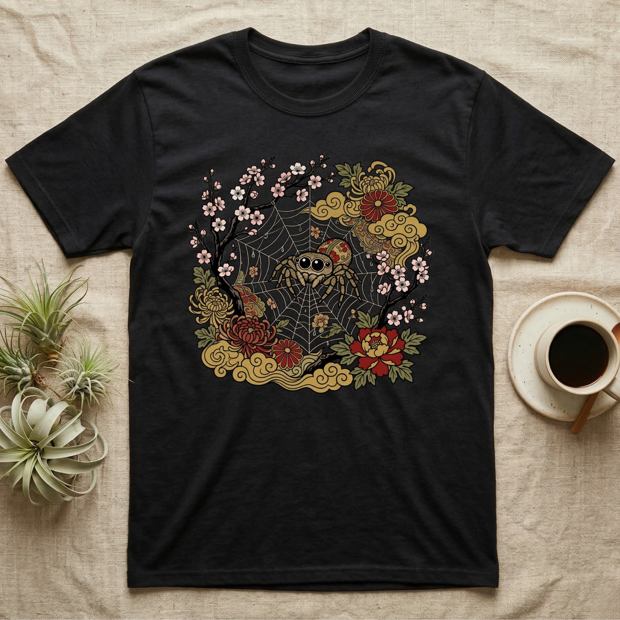 Black t-shirt with a spider and floral pattern in Japanese art style.