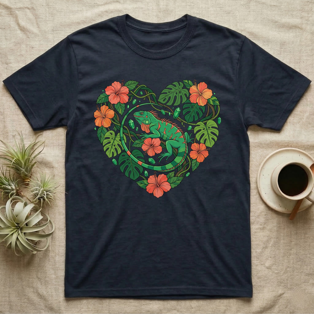 Dark t-shirt with a green iguana inside a heart-shaped tropical foliage design.