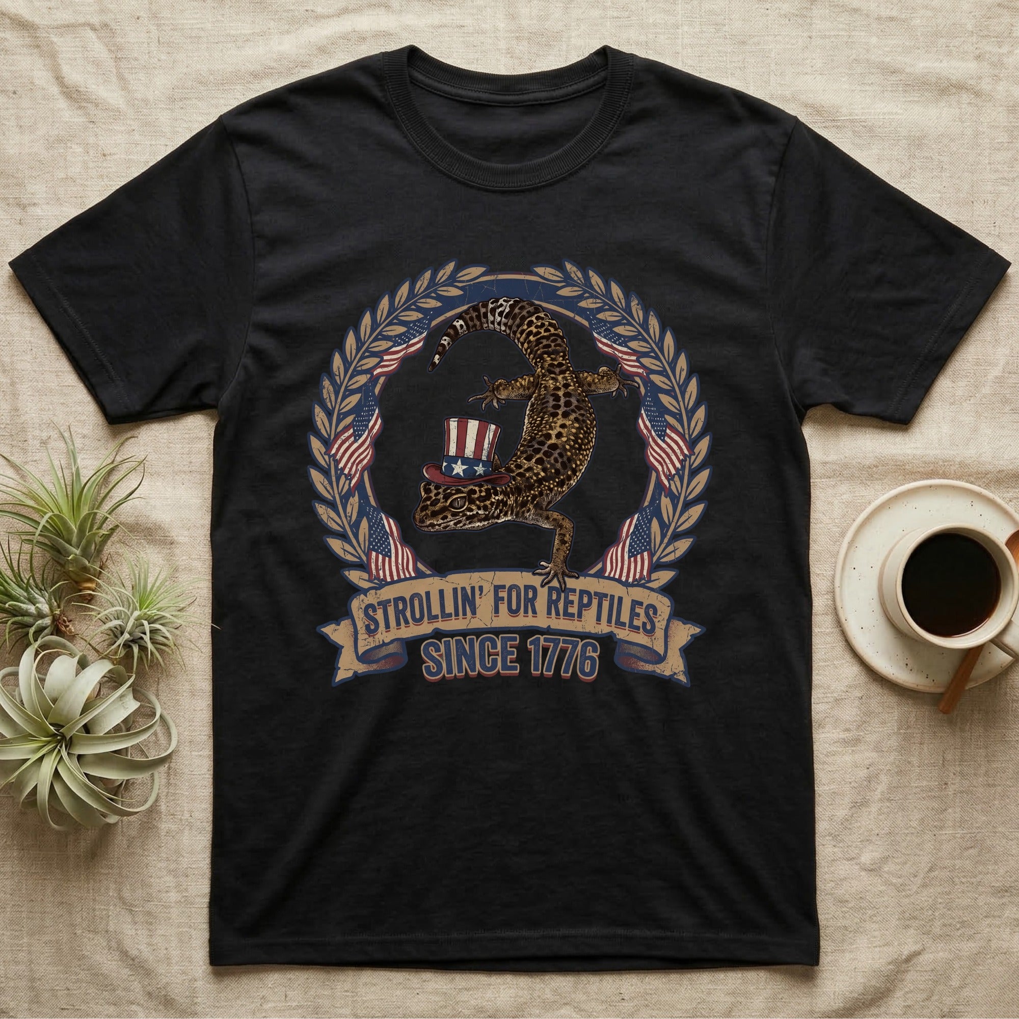 Leopard Gecko 1776 T-Shirt in Black — Vintage badge of a leopard gecko in an Uncle Sam hat with laurel wreath and flags, banner reading Strollin' For Reptiles Since 1776.