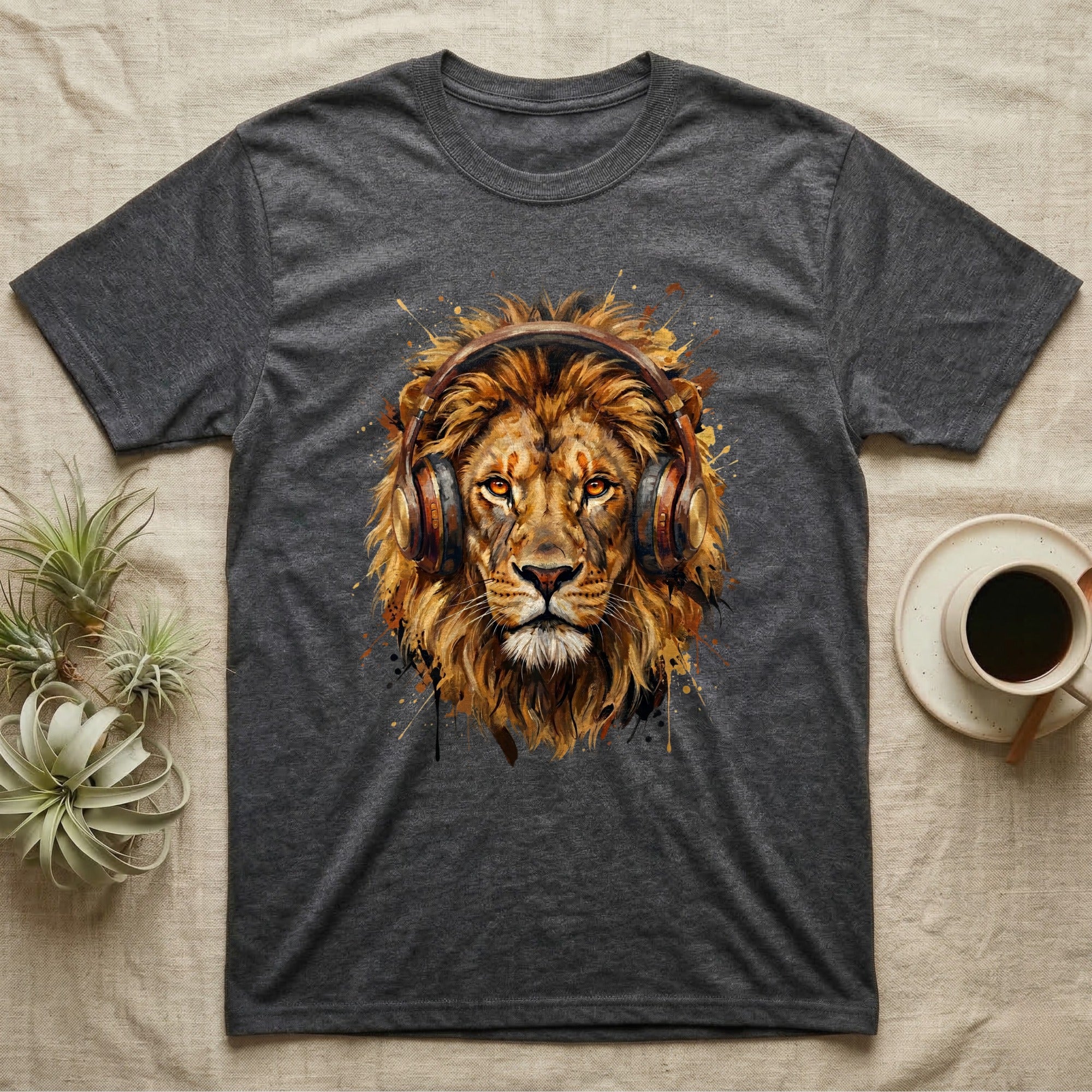 Dark grey t-shirt featuring a lion wearing headphones with a paint splatter design.