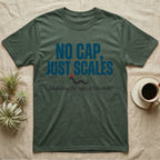 Rattlesnake No Cap T-Shirt in Military Green — Big distressed text No Cap Just Scales over a tiny snake in a red top hat with 250 Years of Free-Hiss below.