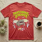 Budgett's Frog Feral T-Shirt in Heather Red — Budgett's frog with wide screaming mouth under jagged acid-green metal text PROFESSIONAL SCREAMER with lily pads