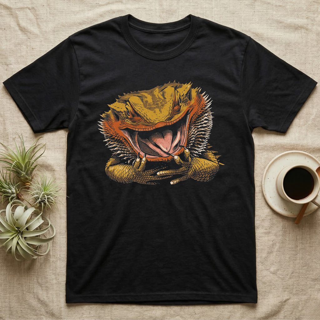 Vintage ink illustration of a bearded dragon head with its mouth wide open, tongue out, front claws raised, no on-shirt text. — shown on a Black tee.