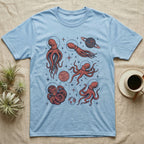 Light blue t-shirt with vintage-style octopuses and planets in space.