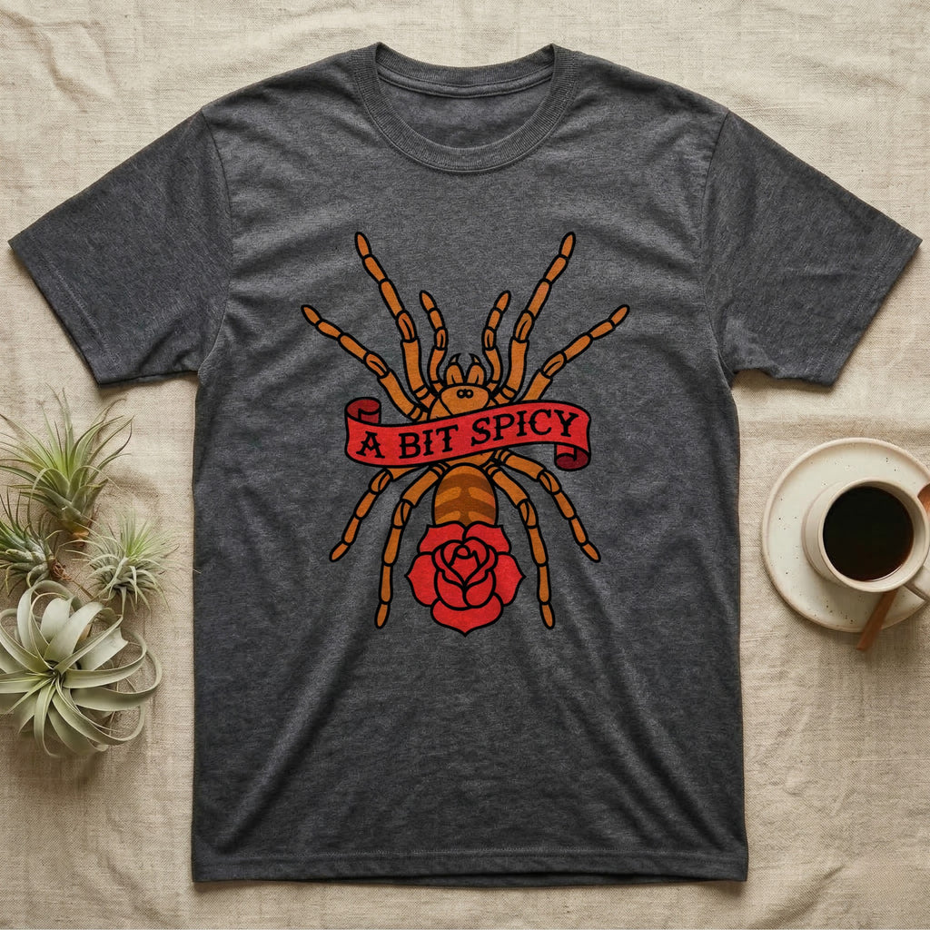 Tarantula A Bit Spicy T-Shirt in Dark Heather — Tattoo-flash orange-baboon-tarantula in threat-pose with banner-scroll "A Bit Spicy" and a flash rose beneath.