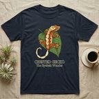 Navy t-shirt featuring a crested gecko illustration on a leaf with "Crested Gecko The Eyelash Wonder" text.