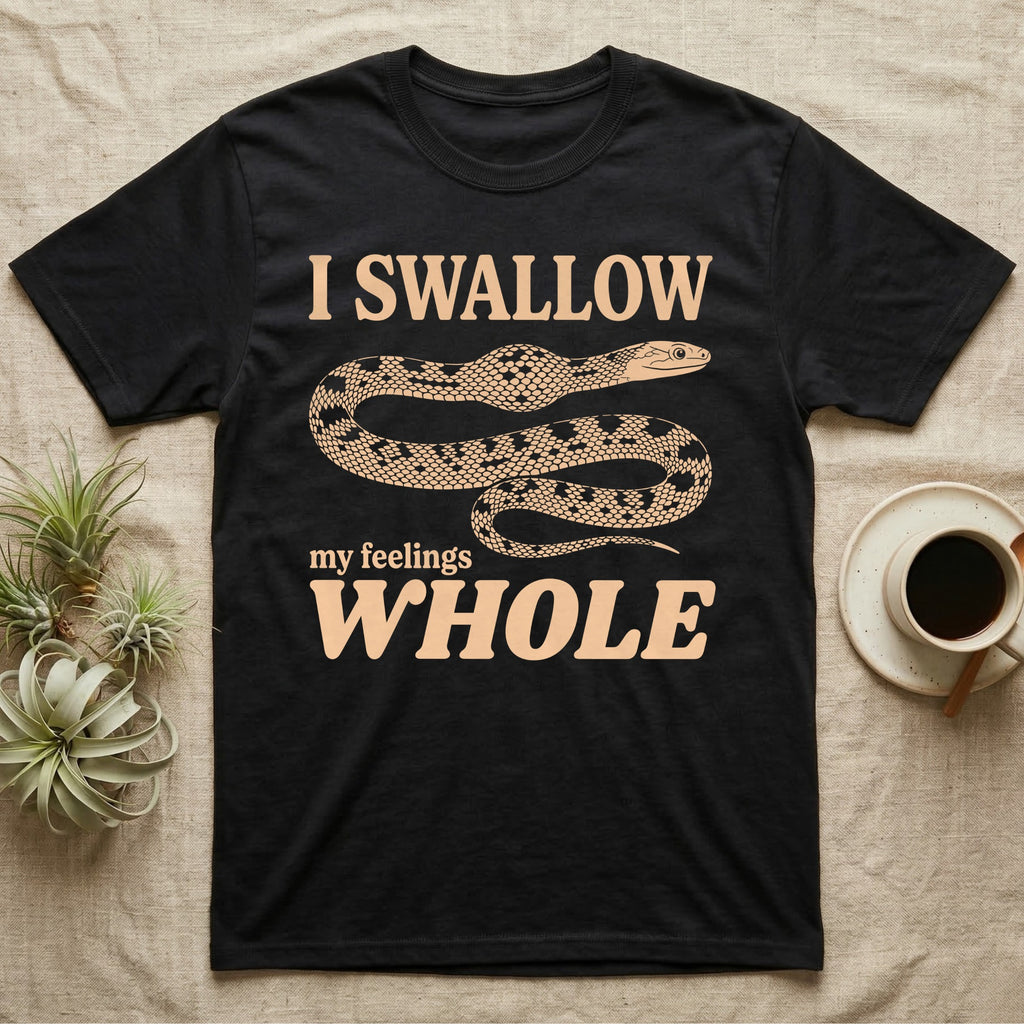 Corn Snake Lump T-Shirt in Black — Cream scale-mosaic corn snake on black with an oval bulge behind its neck under cream words: I SWALLOW my feelings WHOLE