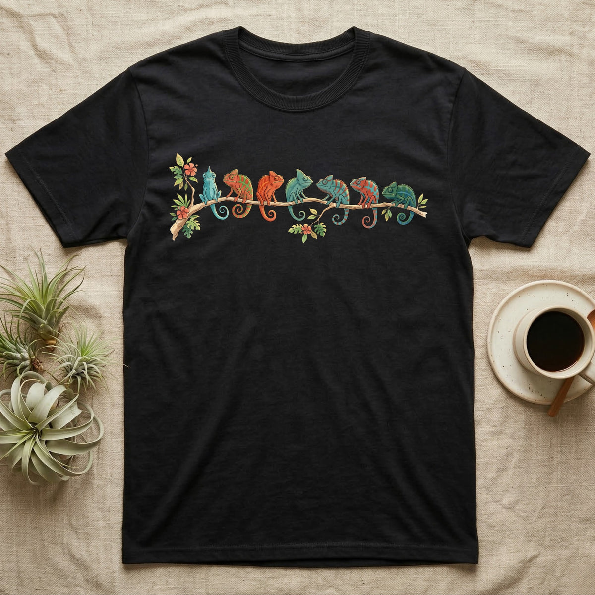 Panther Chameleon Canopy Crew T-Shirt in Black — Watercolor illustration of seven panther chameleons in Madagascar locale colours on a branch, dark grey T-shirt design.