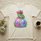 Frog in pink cowboy hat on disco ball.