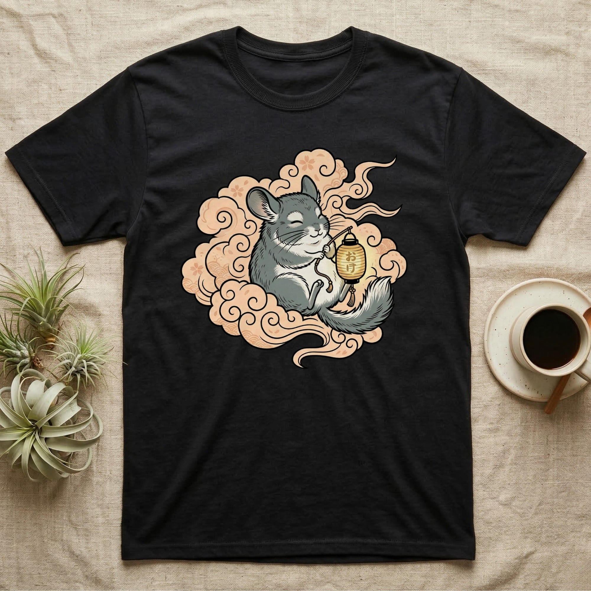 Black t-shirt with a chinchilla sitting on clouds holding a lantern.