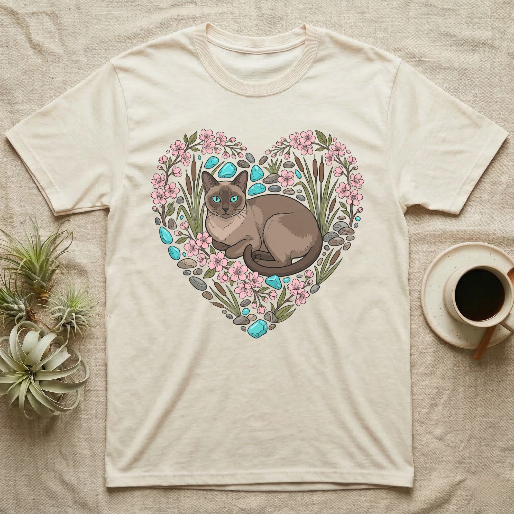 Cream t-shirt with a Siamese cat in a floral heart frame.