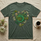 Green t-shirt with a heart-shaped design of a lizard and foliage.