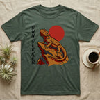 Dark green t-shirt with a bearded dragon illustration and "SUN SEEKER" text.