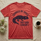 Leopard Gecko Spots T-Shirt in Heather Red — Navy silhouette of a spotted leopard gecko walking under arched words Changed My Spots, beside They Said I Couldn't