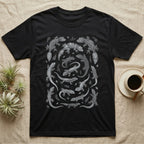 Gecko Specimen Plate T-Shirt in Black — Engraved white-line specimen plate of fifteen Madagascan geckos and fern sprigs on charcoal grey