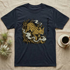 Dark t-shirt with spotted cat and Japanese text in tall grass.