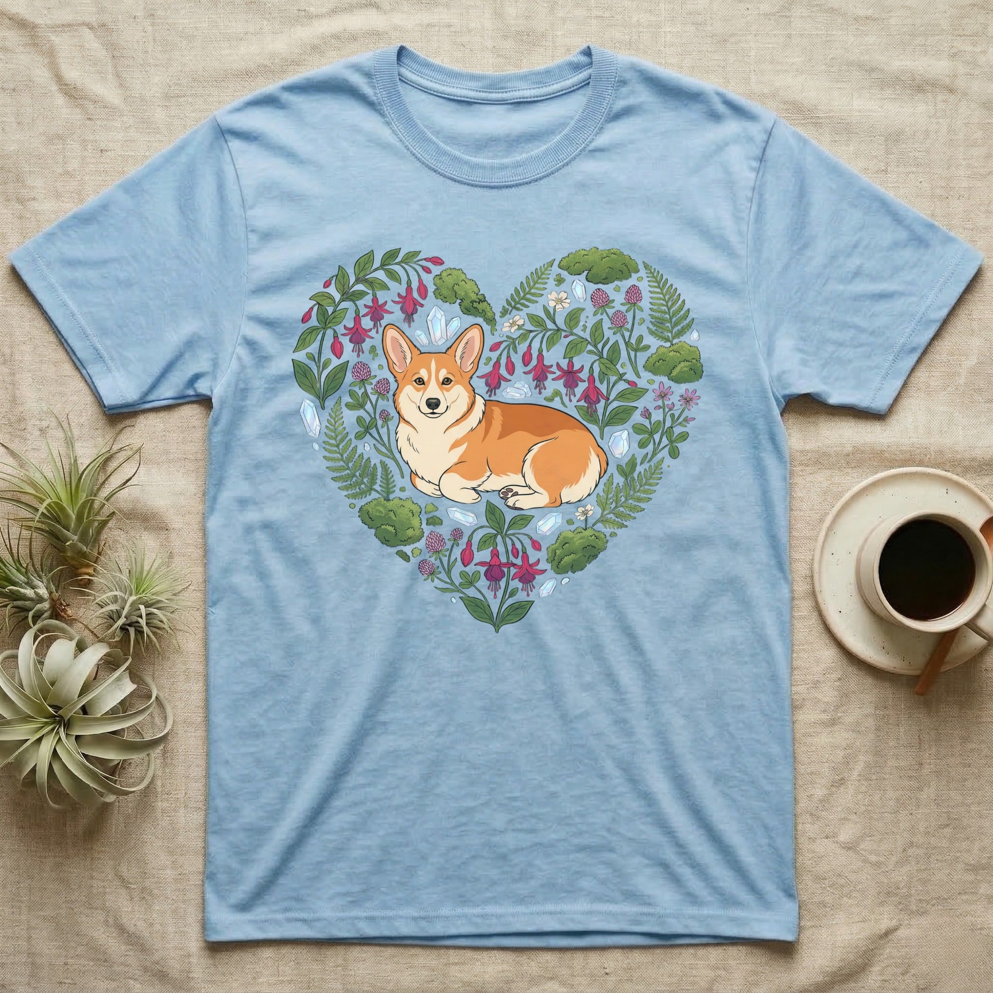 Light blue t-shirt with a corgi illustration in a floral heart.