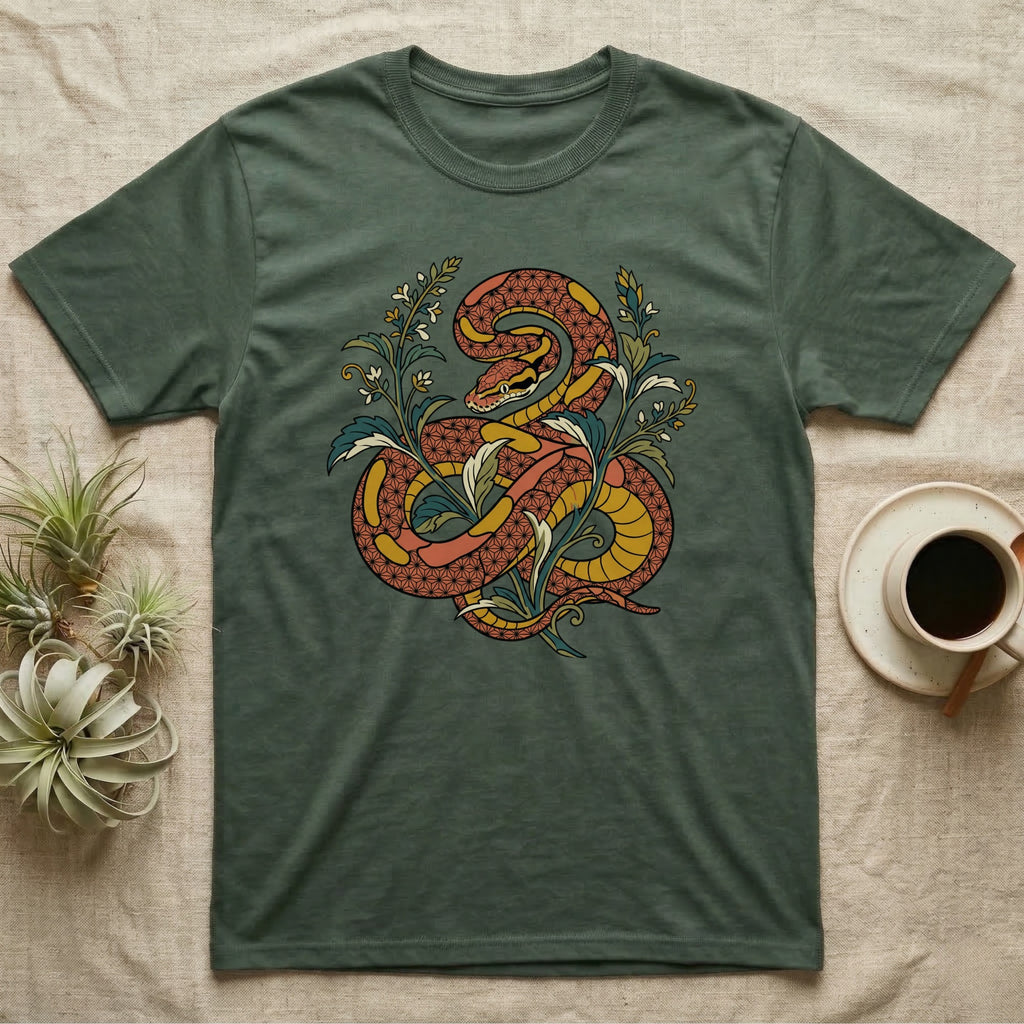 Green t-shirt with coiled snake and floral design in red, yellow, and blue.