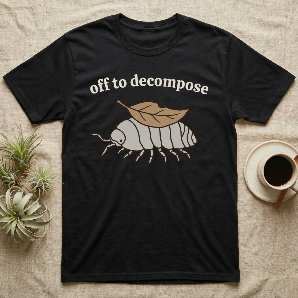 Isopod Decomposer T-Shirt in Black — Minimal doodle of a grey isopod walking off with a dead leaf on its back under the words off to decompose