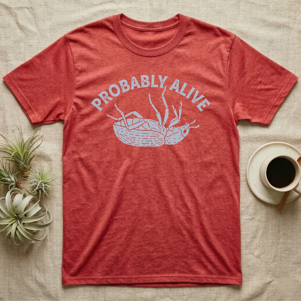 Death Feigning Beetle Probably Alive T-Shirt in Heather Red — Chalk blue beetle lying on its back with legs raised, beneath two arched charcoal capitals reading PROBABLY ALIVE.
