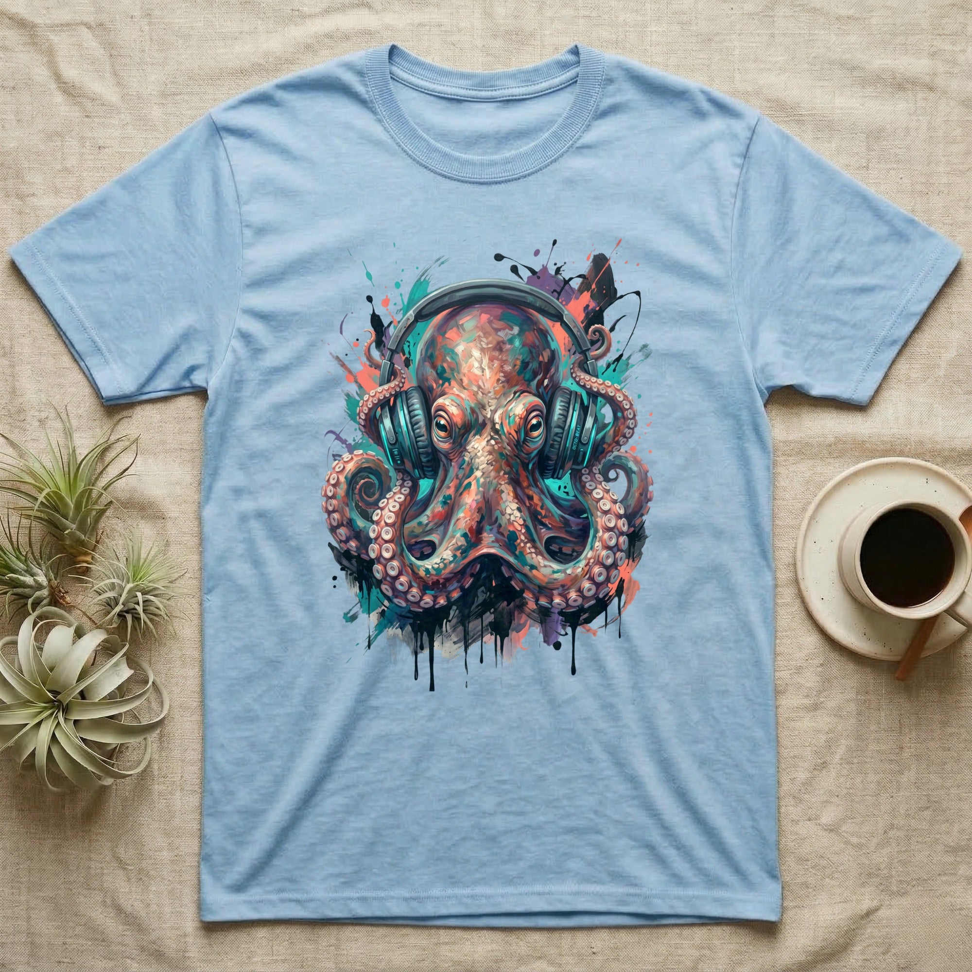 Light blue t-shirt with colorful abstract octopus wearing headphones.